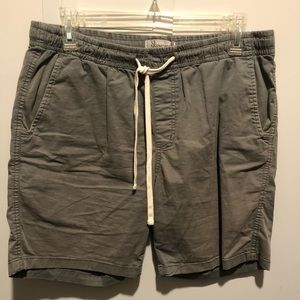 Green/Gray drawstring shorts.